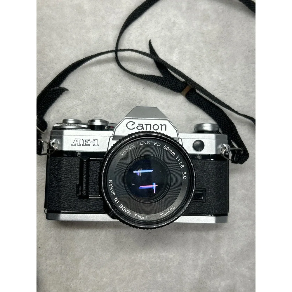 Canon AE-1 Film Camera SLR 35mm 50mm Lens Flash Case Manual Film Lot Untested